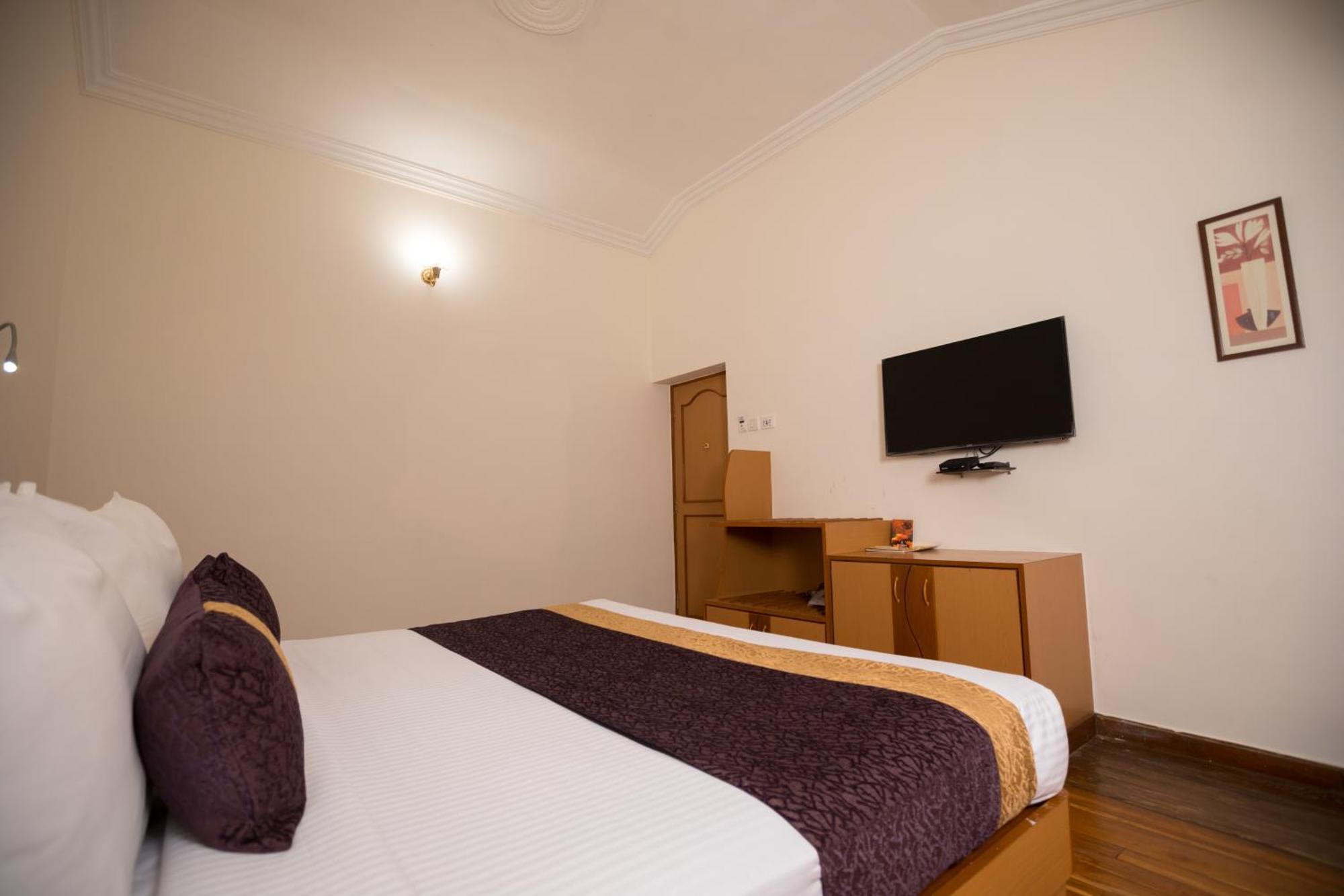 Hotel Kodai International Kodaikanal Rum bild