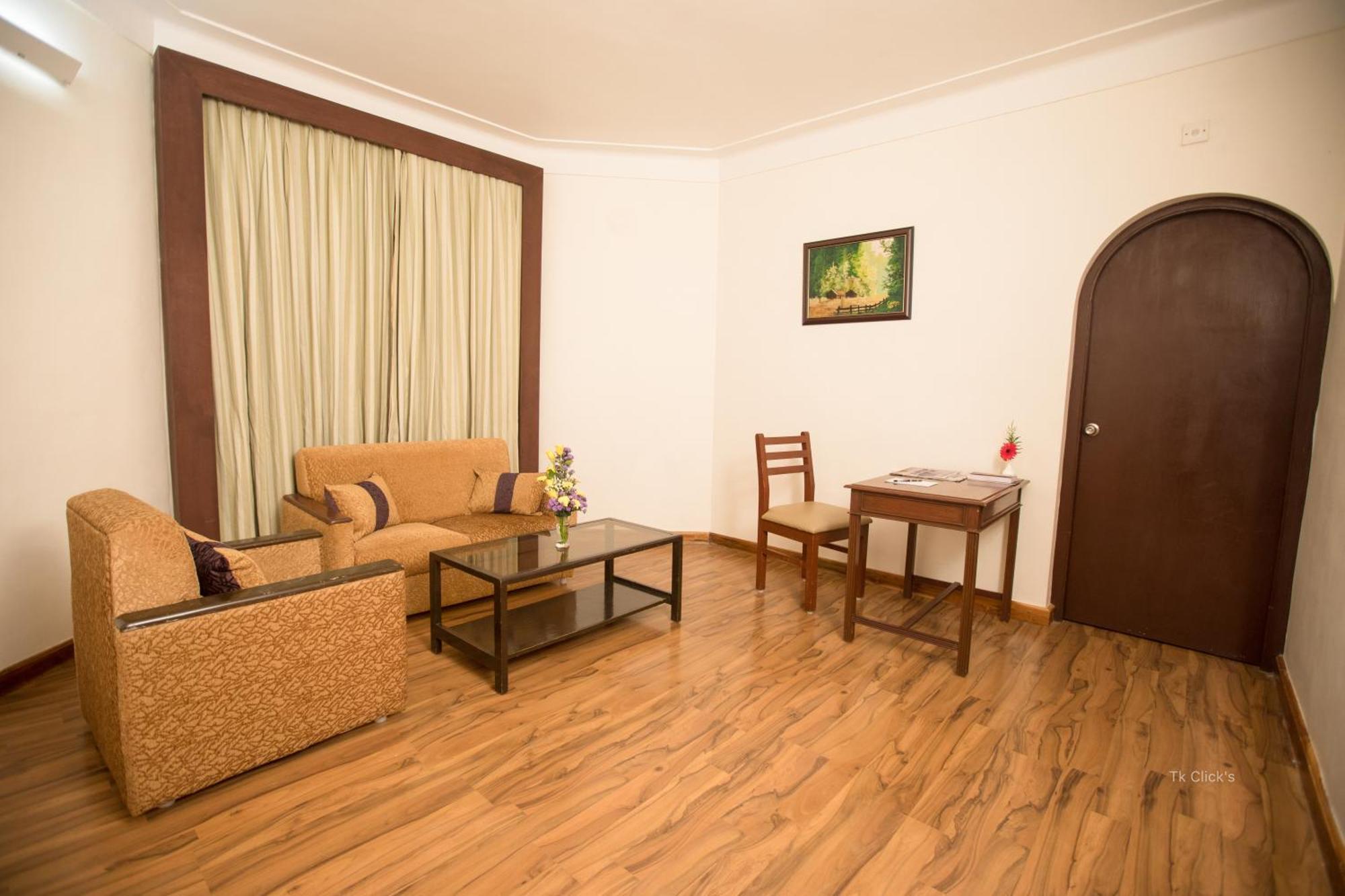 Hotel Kodai International Kodaikanal Rum bild